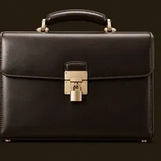 Locked leather briefcase — Kingmaker Casino